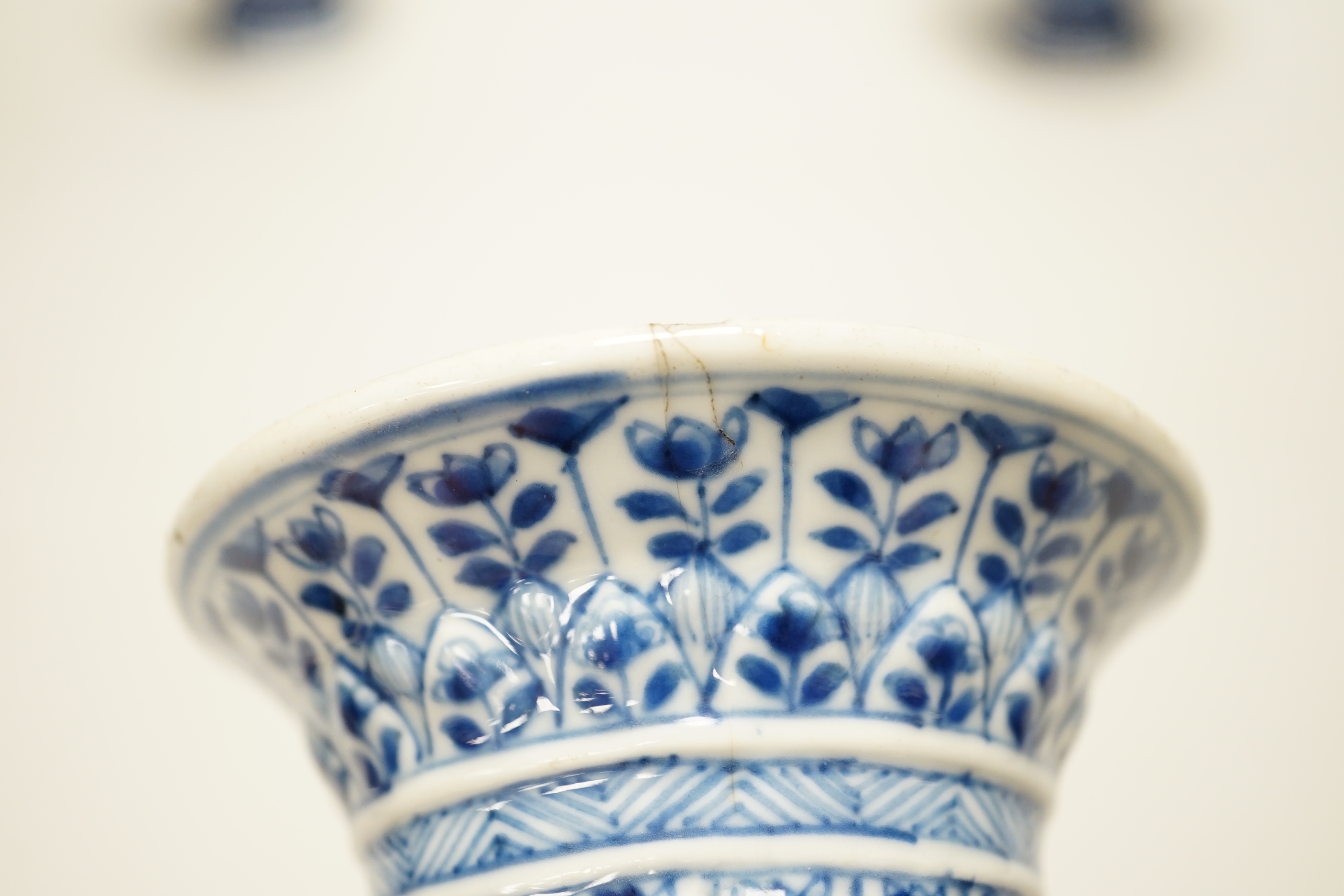 Four Chinese Kangxi period blue and white small vases, tallest 16cm high